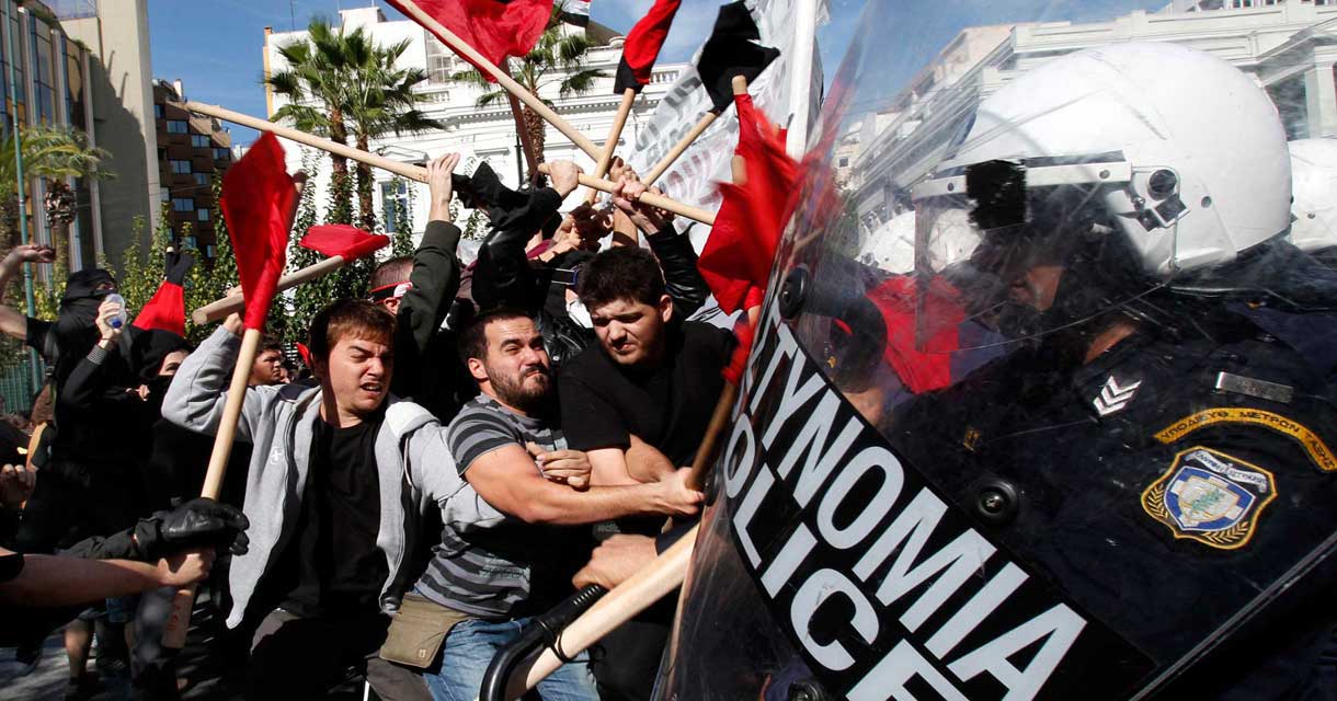 Protestors against austerity confront riot police in Greece, October 2010