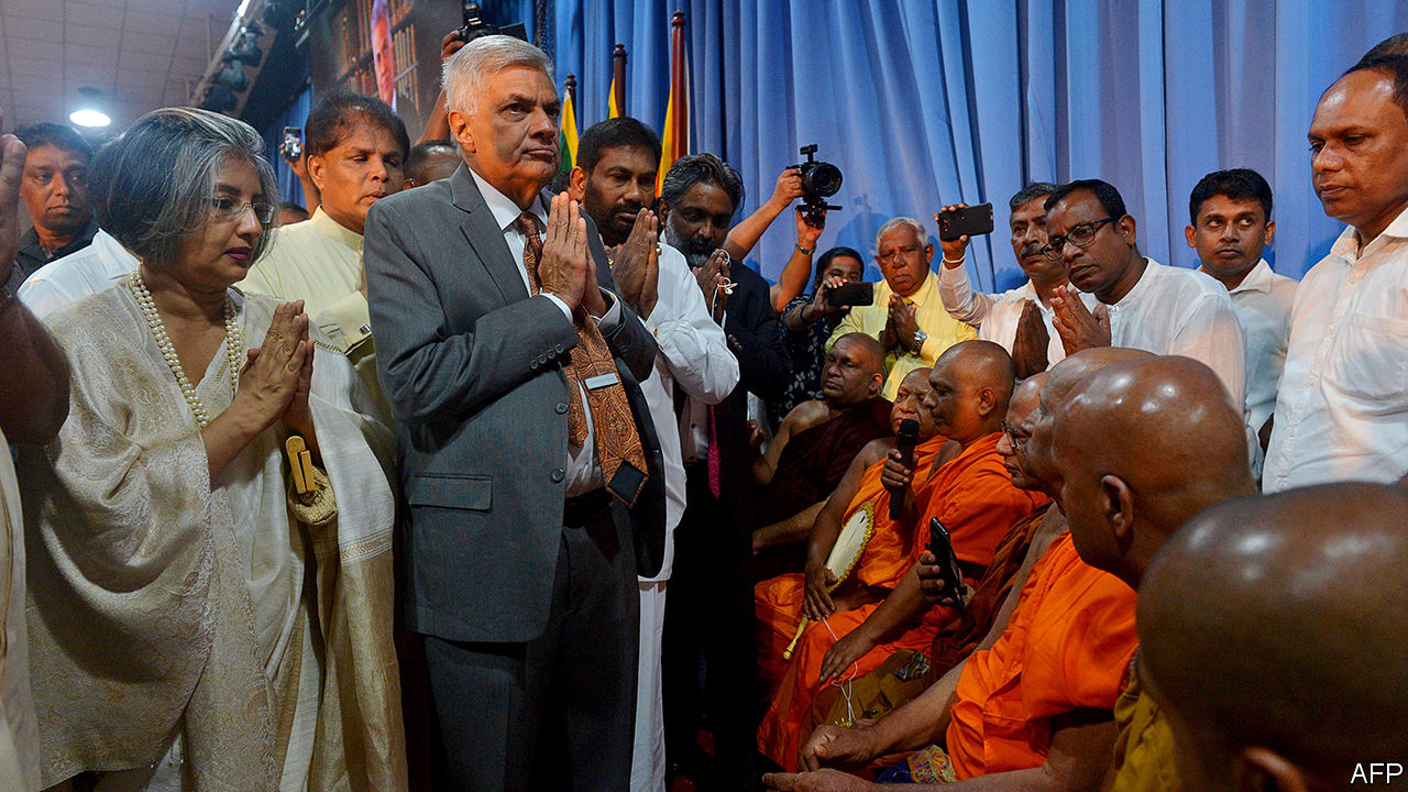 Sri Lankas Prime Minister Regains Office Humiliating The President